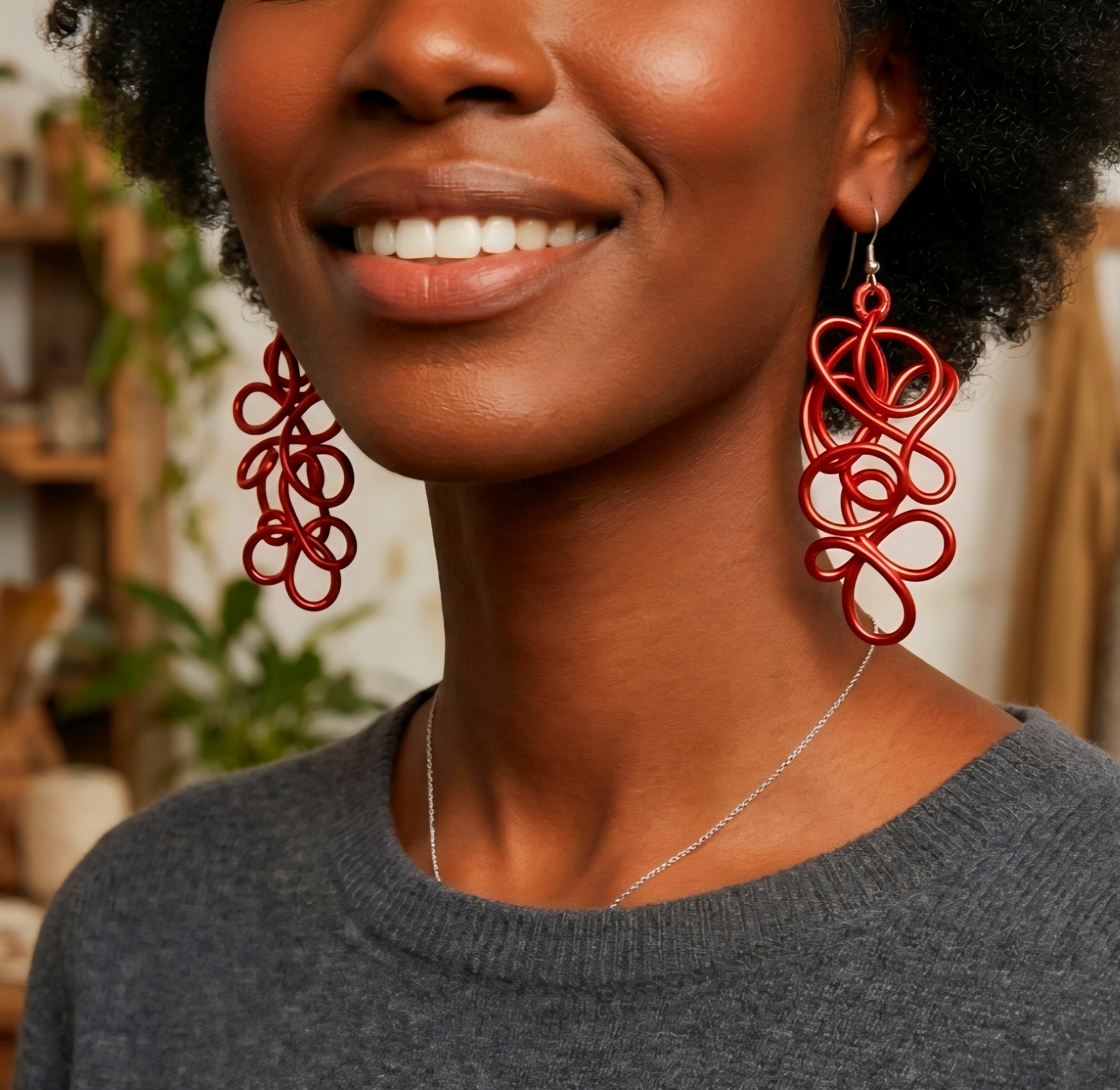 Red abstract sculpture wire earrings